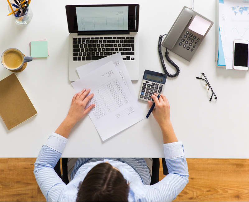A Cloud Bookkeeper doing his work with a laptop